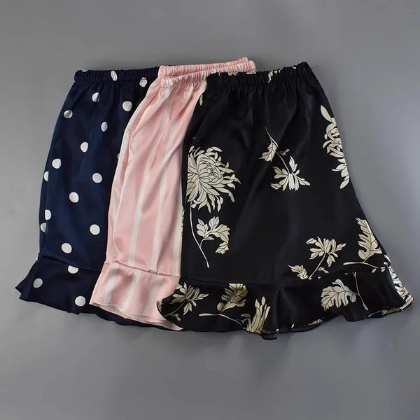 Bas de pyjama satin femme noir, rose et noir avec points blancs