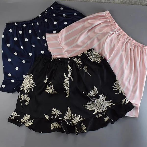Bas de pyjama satin femme noir, rose et noir avec points blancs