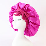Bonnet de nuit pour cheveux bouclés rose foncé