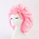 Bonnet de nuit pour cheveux bouclés rose clair