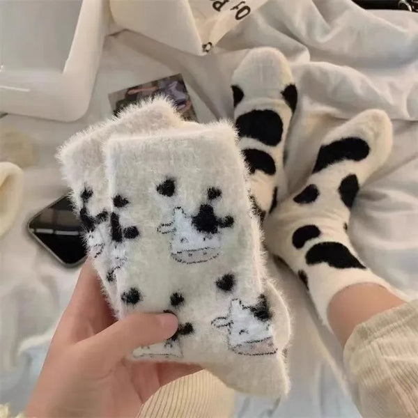 Chaussettes en velours
 vaches (blanches et noires)